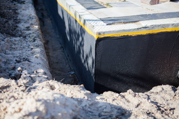 Professional Waterproofing technician working in Warren, IL
